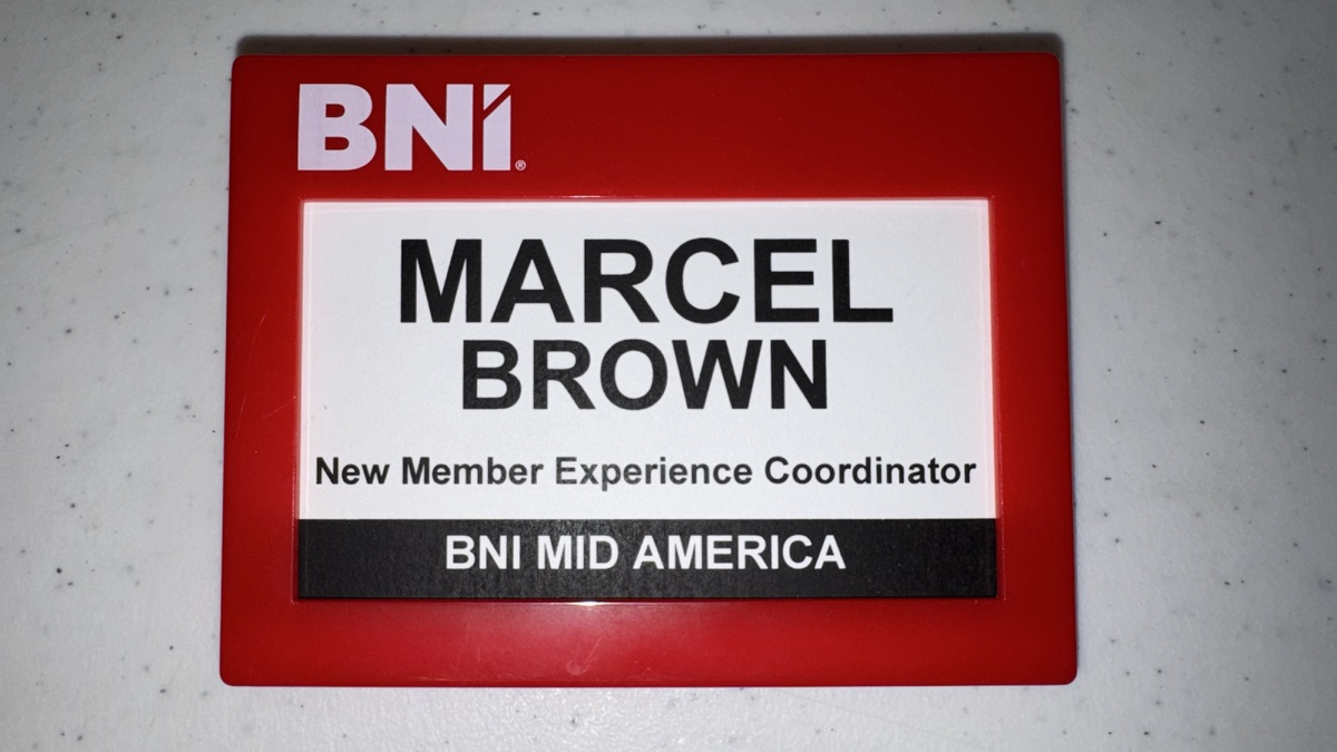 Red BNI Regional Support Team badge holder with a regional insert and black footer